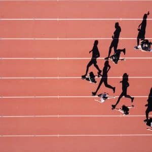 group of people running on stadium